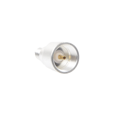 Imagen de Adaptador UNIDAPT Hembra a SMA Hembra Inverso. Plata / Oro / Teflón.